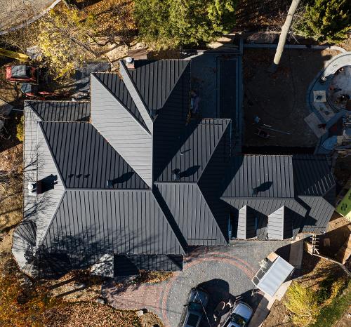 Custom standing seam roof installation in Oakville